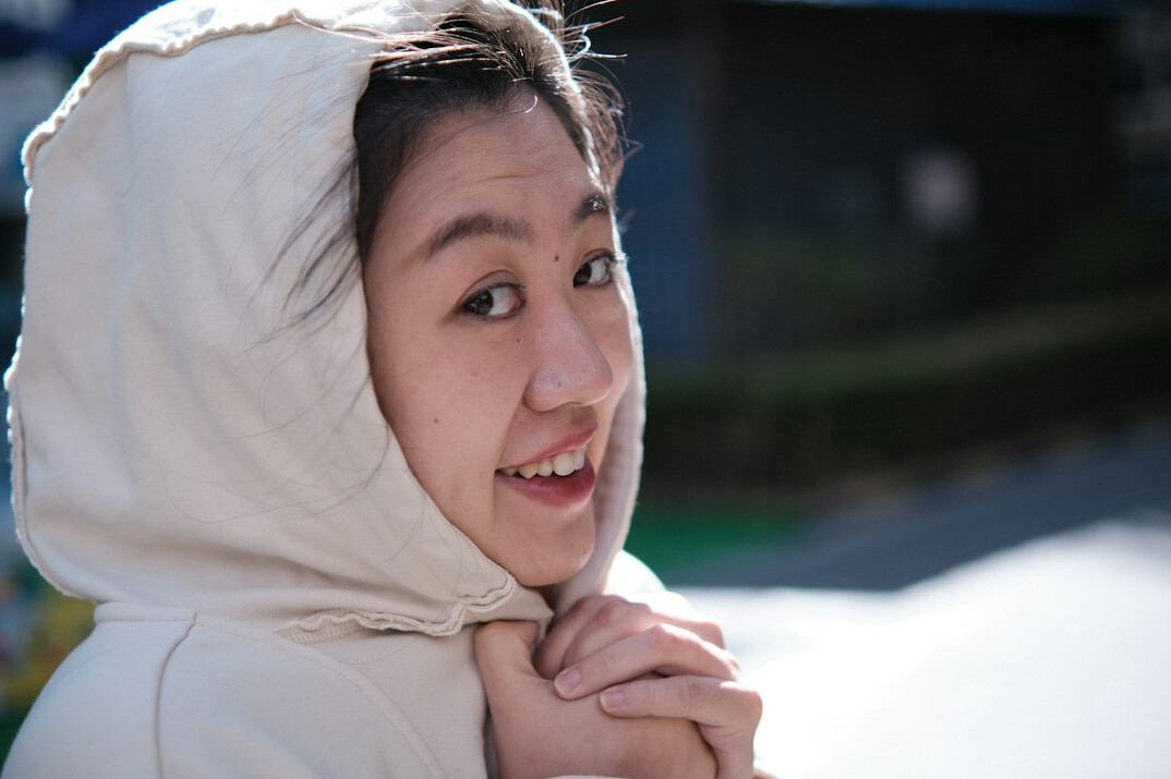 Portrait of a young woman with a warm smile