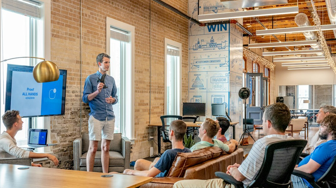 leader presenting to diverse team