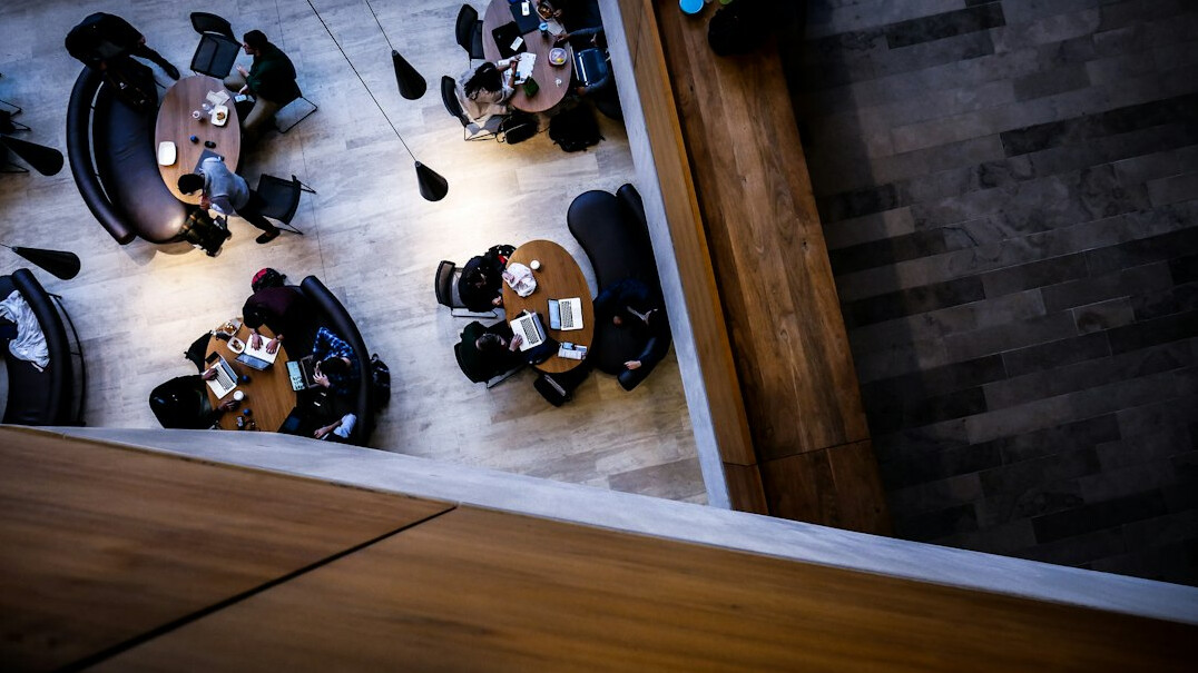Business team discussing ideas around a table