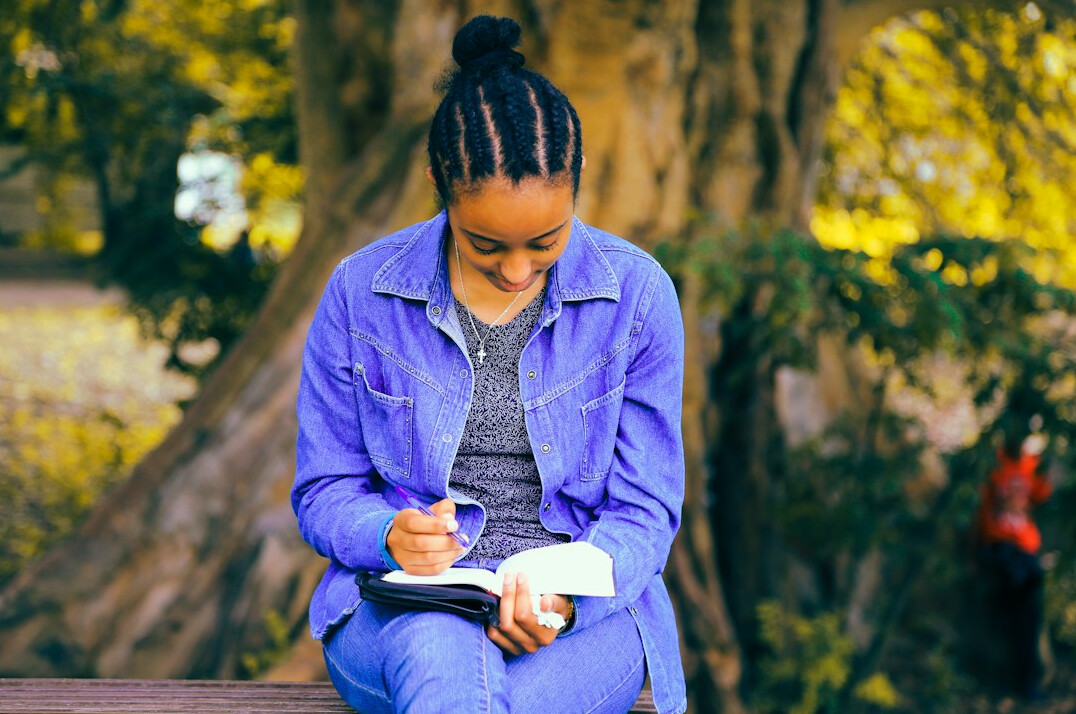 woman writing notes